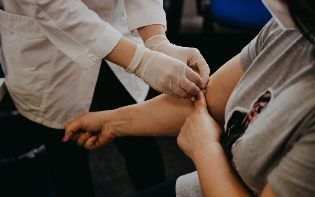 Gentle acupuncture treatment for pain relief, part of Roots To Branches Whole Health Clinic services.